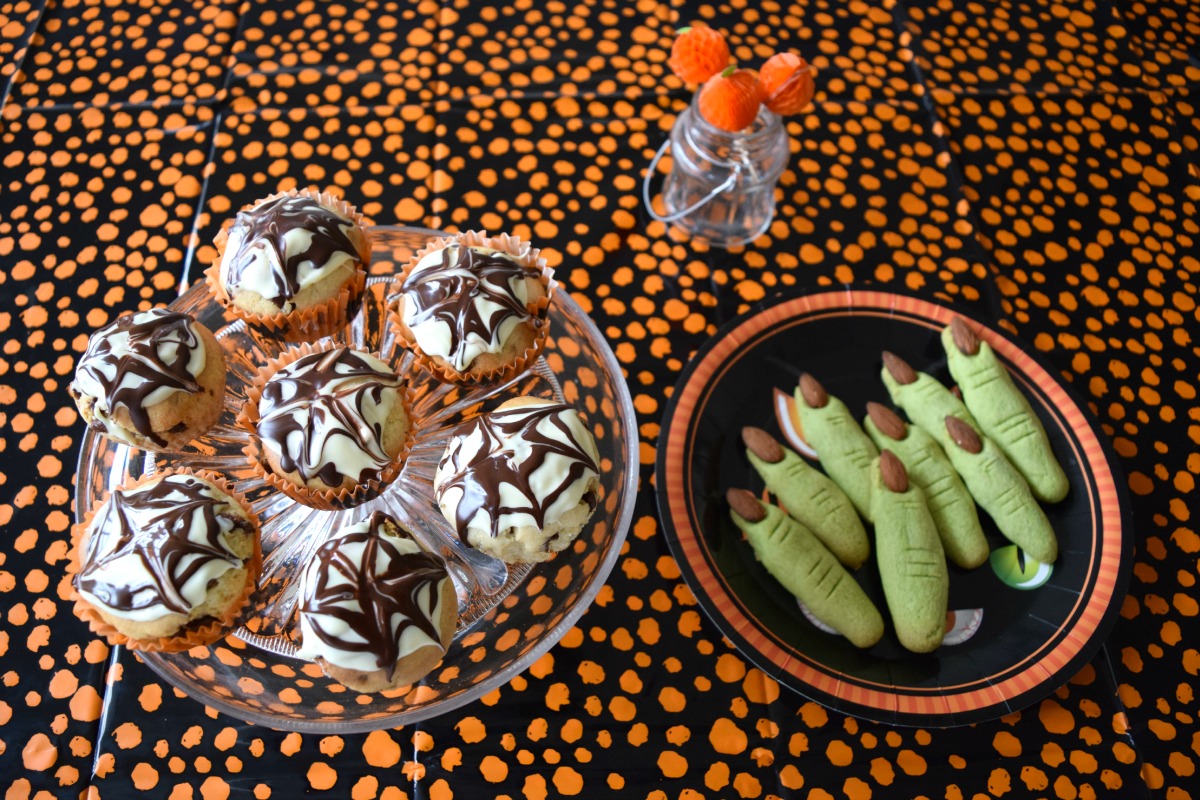 Halloween cobweb cakes and finger biscuits