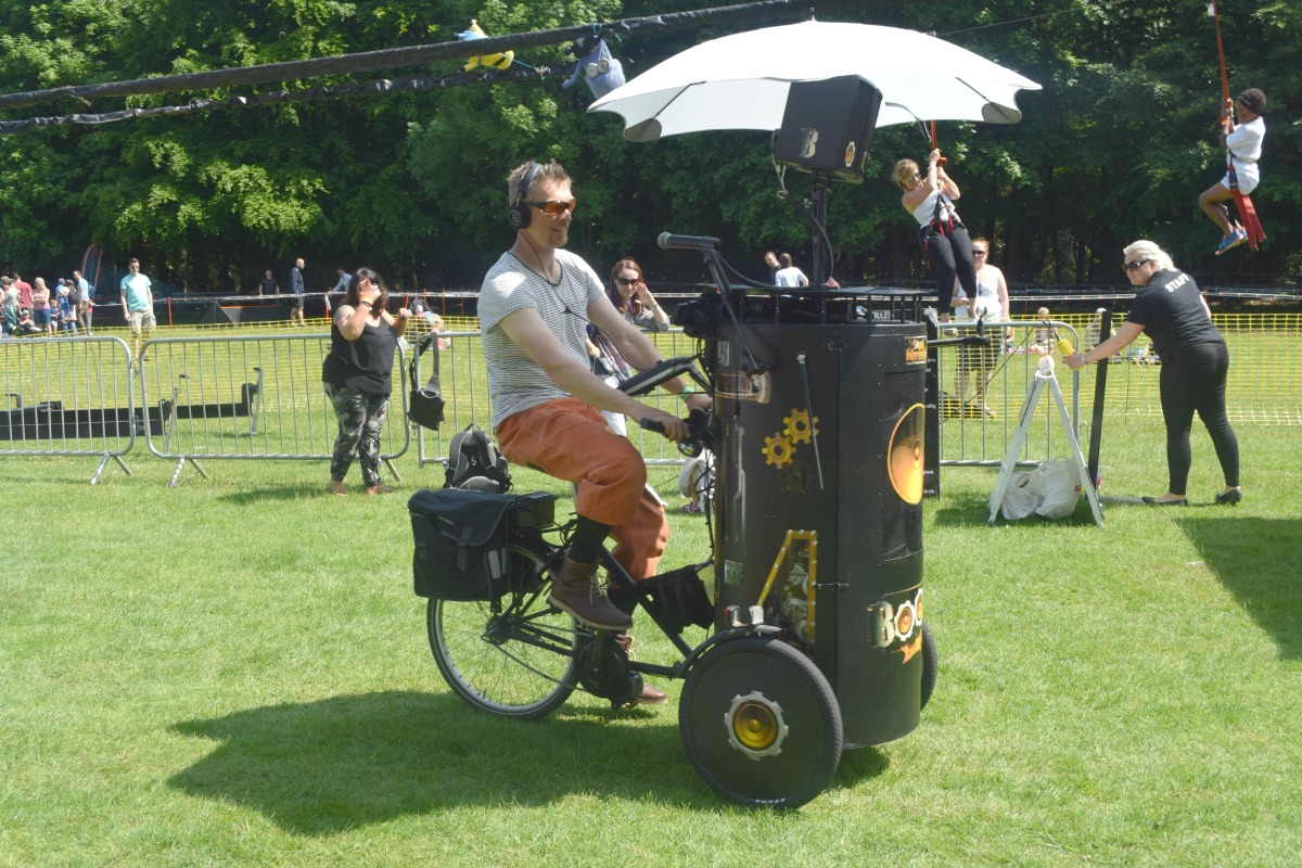 Man on bike at festival