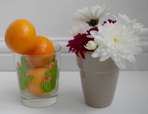 Tangerines, flowers and a cactus glass http://rainbeaubelle.com